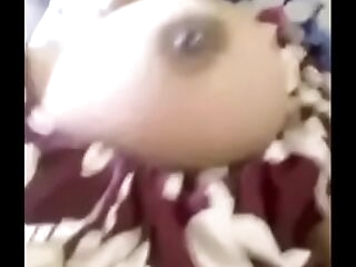 Desi aunty Wringing boobs to get milk